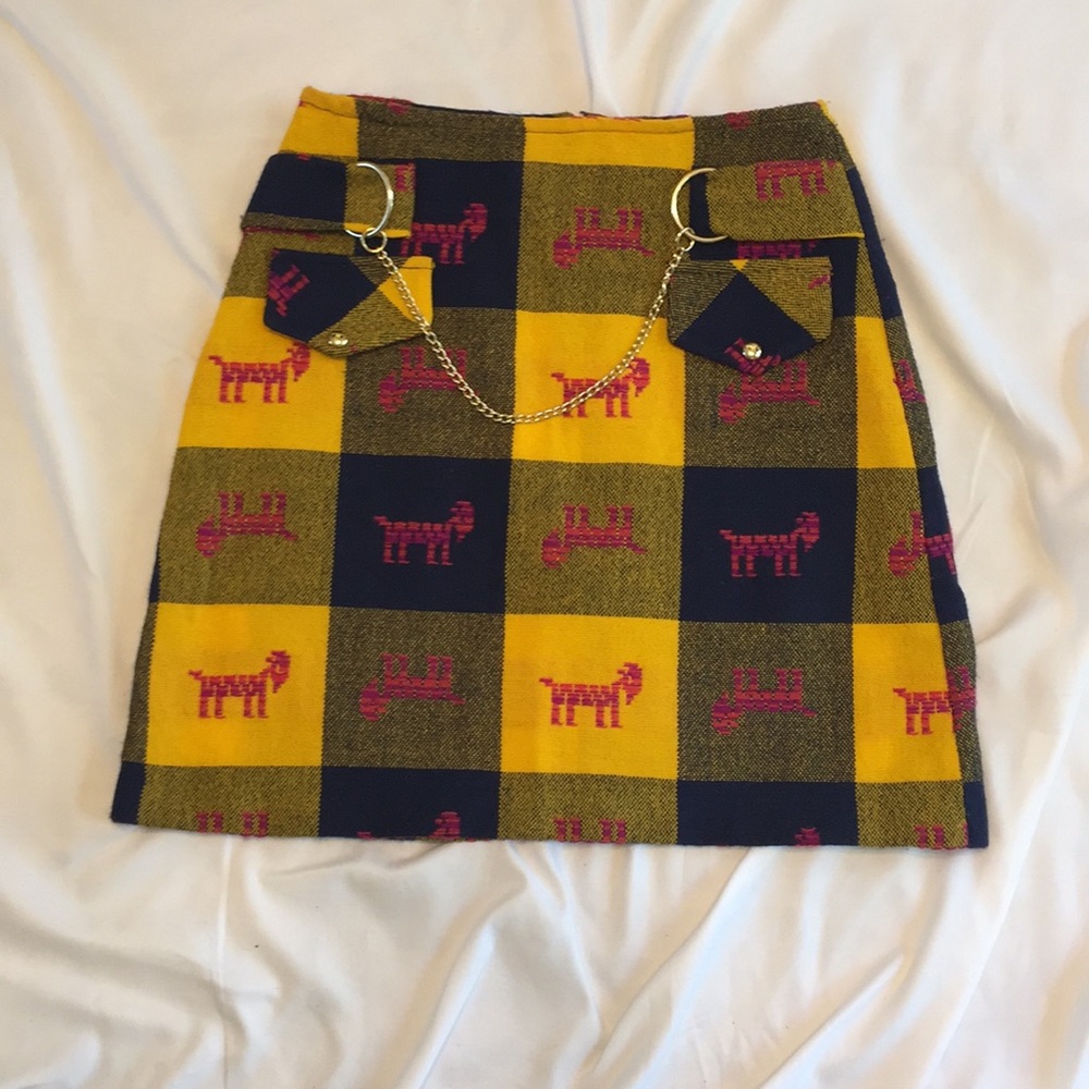 Plaid goat skirt with chain accent